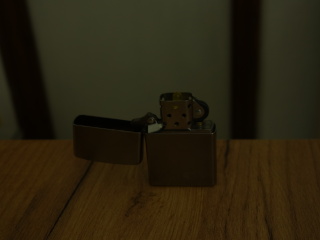 Photo of the lighter in 
        ambient light conditions (underexposed)
